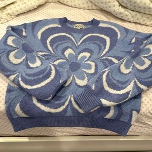 Fuzzy sweater with flower pattern